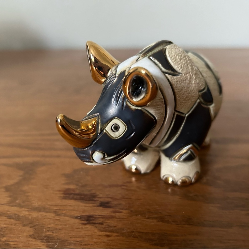 Elegant Gold and Black Ceramic Rhino Figurine
